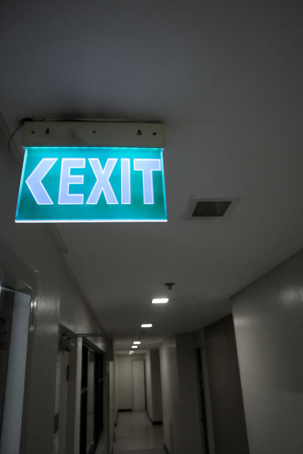 LED Emergency Exit Combo Kit — 2-Pack | LumixyLab — exit sign installed in corridor